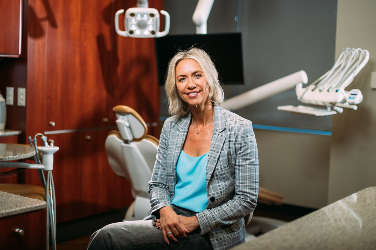 Kandice Swarthout sits in one of the Dental Hygiene suites.