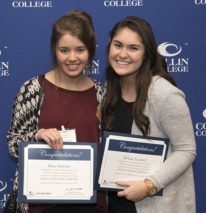 students holding certificate