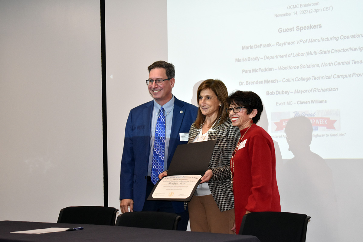 Raytheon and Collin College held a signing ceremony for the expansion of the occupational roles in the Raytheon Registered Apprenticeship Program on Nov. 14 at the Raytheon Optics Consolidated Manufacturing Center.  Left to right: Collin College Technical Campus Provost Dr. Brenden Mesch, Raytheon Vice President of Manufacturing Operations Maria DeFrank, and Department of Labor Multi-State Director Maria Brady. Photos Courtesy of Raytheon|An RTX Business