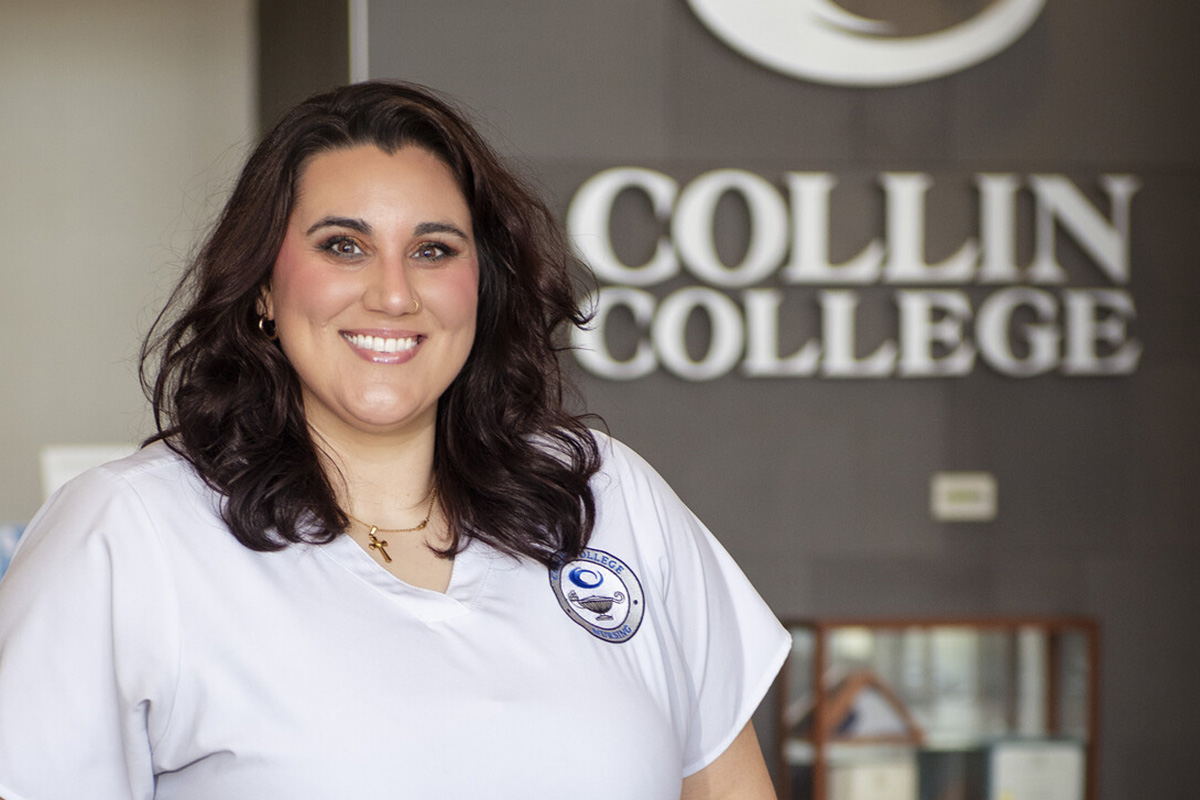 Sheeka Jackson, a licensed vocational nursing student at Collin College, stands in the welcome center at McKinney Campus.