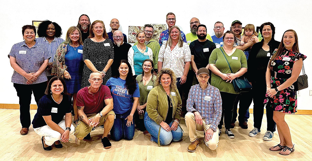 Photo by Claudette Lowery, assistant, The Art Gallery -- Members of the Collin College Fine Arts faculty pose in the gallery at last year’s Annual Collin College Art Faculty exhibition. Many of the same faculty members will participate in this year’s show as well. 